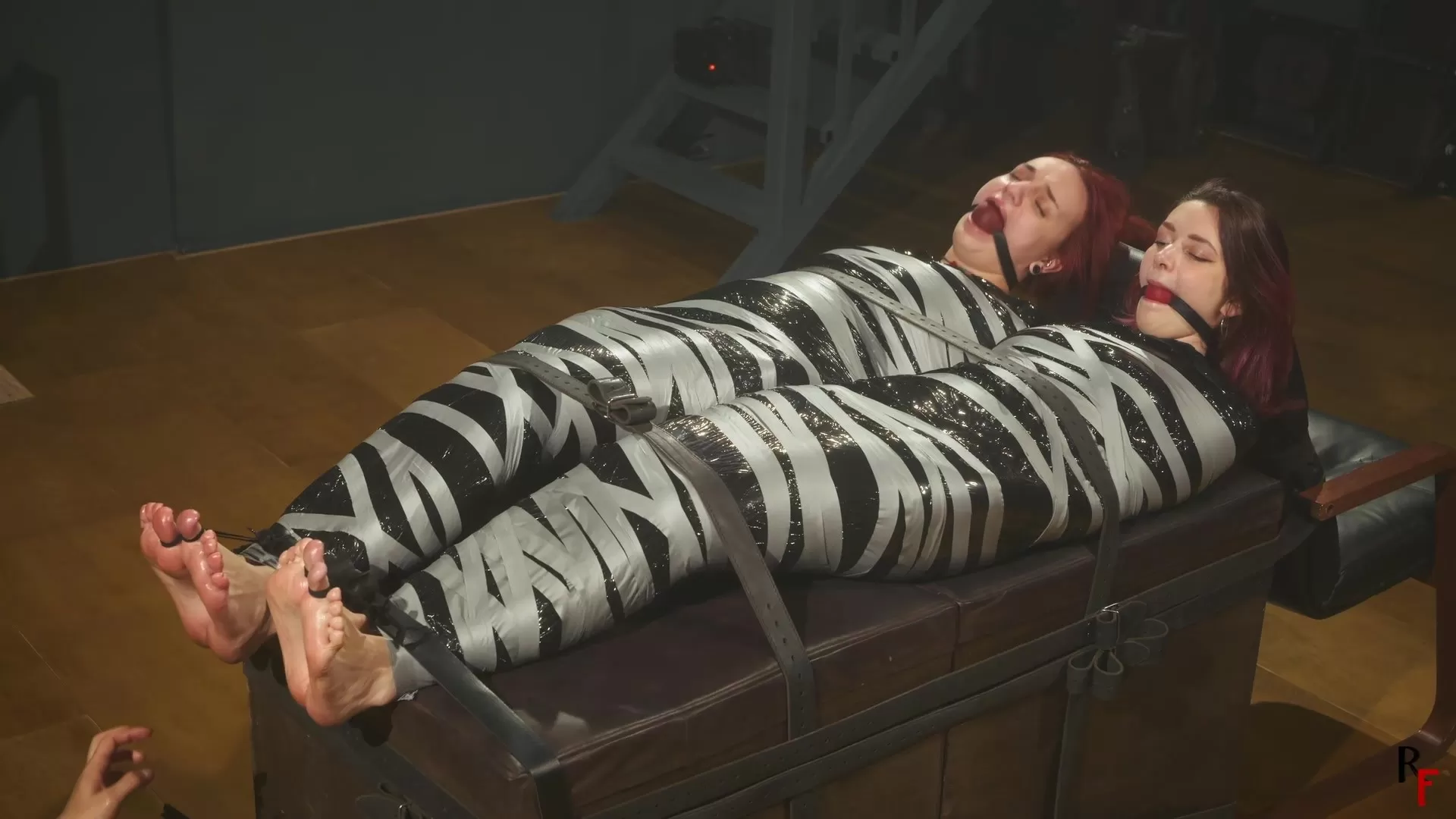 RFStudioProduction – Elaria and Tilda – Double Mummification and Foot Tickling.webp